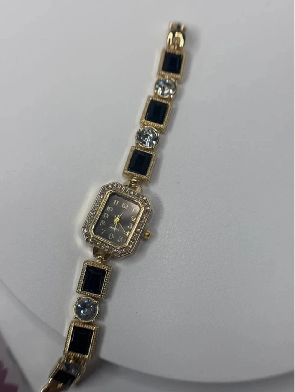 7.5 inch watch bracelet, black and clear cz, gold tone